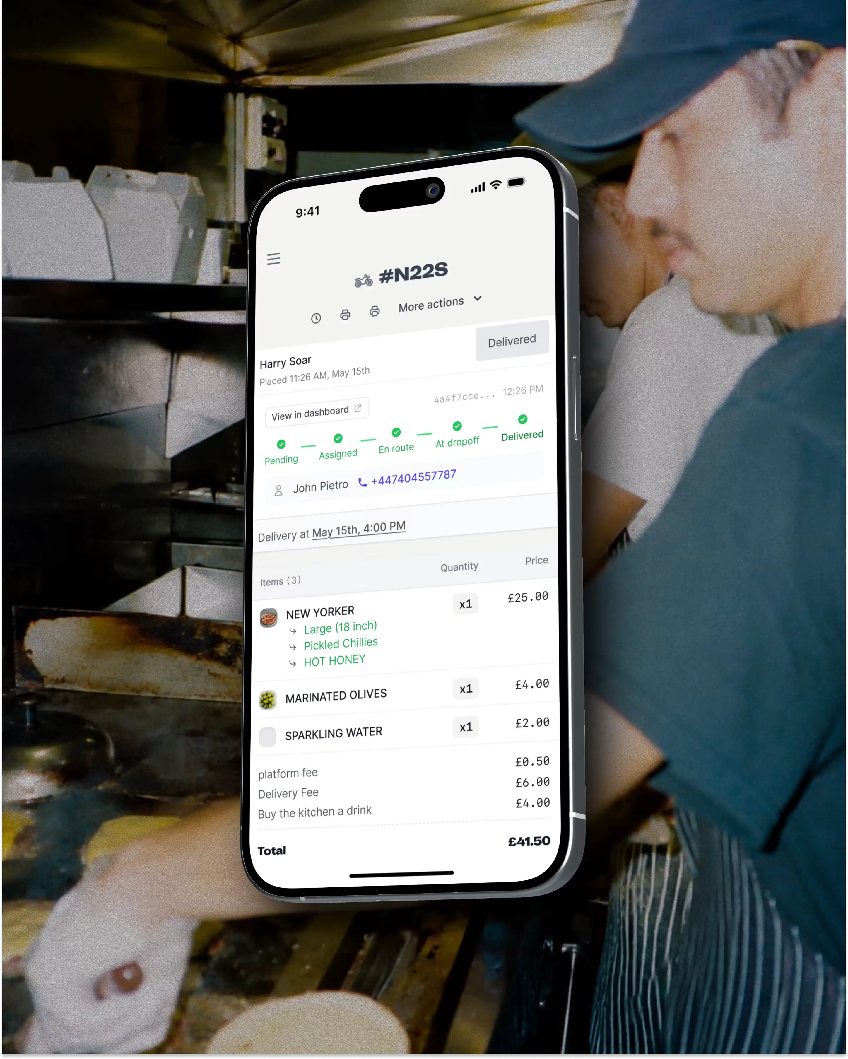 Storekit delivery order with live status timeline and courier details on a phone