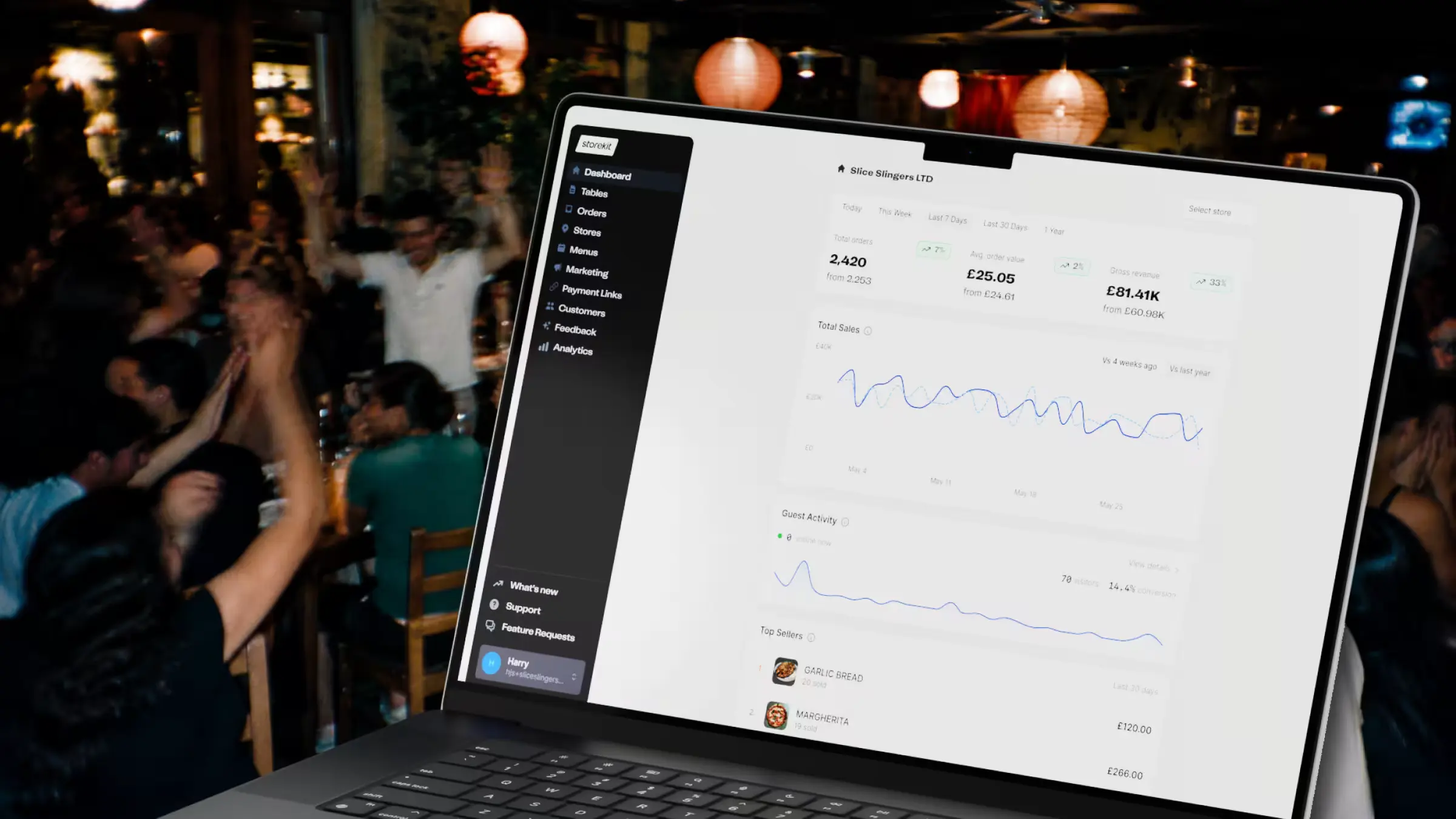 Storekit dashboard on a laptop in a busy restaurant